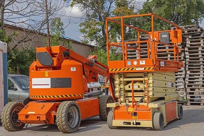 pallets being moved by forklift in a warehouse setting in Grand Chute WI